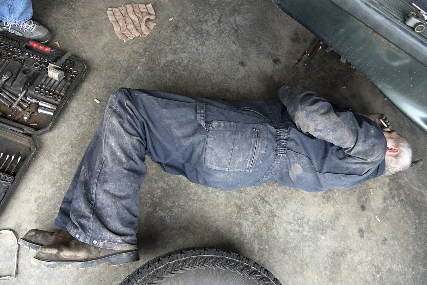  Randy Friar, of Pomeroy, works on his wife's vehicle at his step brother's, John Rankin, garage in Tuppers Plains. "It's the type of community you want to live in. You know almost everyone and we all help each other out when you can," said Rankin. 