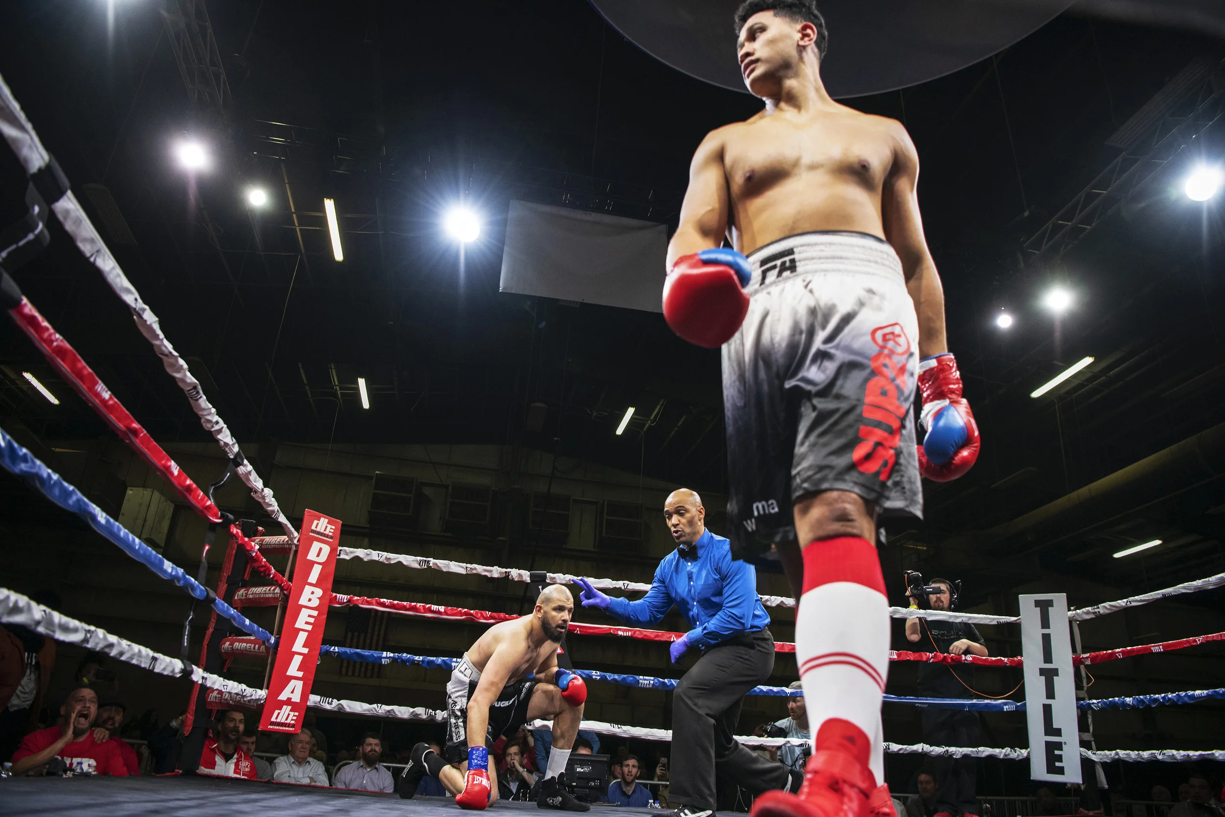  Heavyweight boxer Junior Fa walks away from his opponent Newfel Ouatah after knocking him down in the first round of the Arnold Sports Festival Pro Boxing main event in Columbus, Ohio. Fa would go on to win by TKO in the first round. 