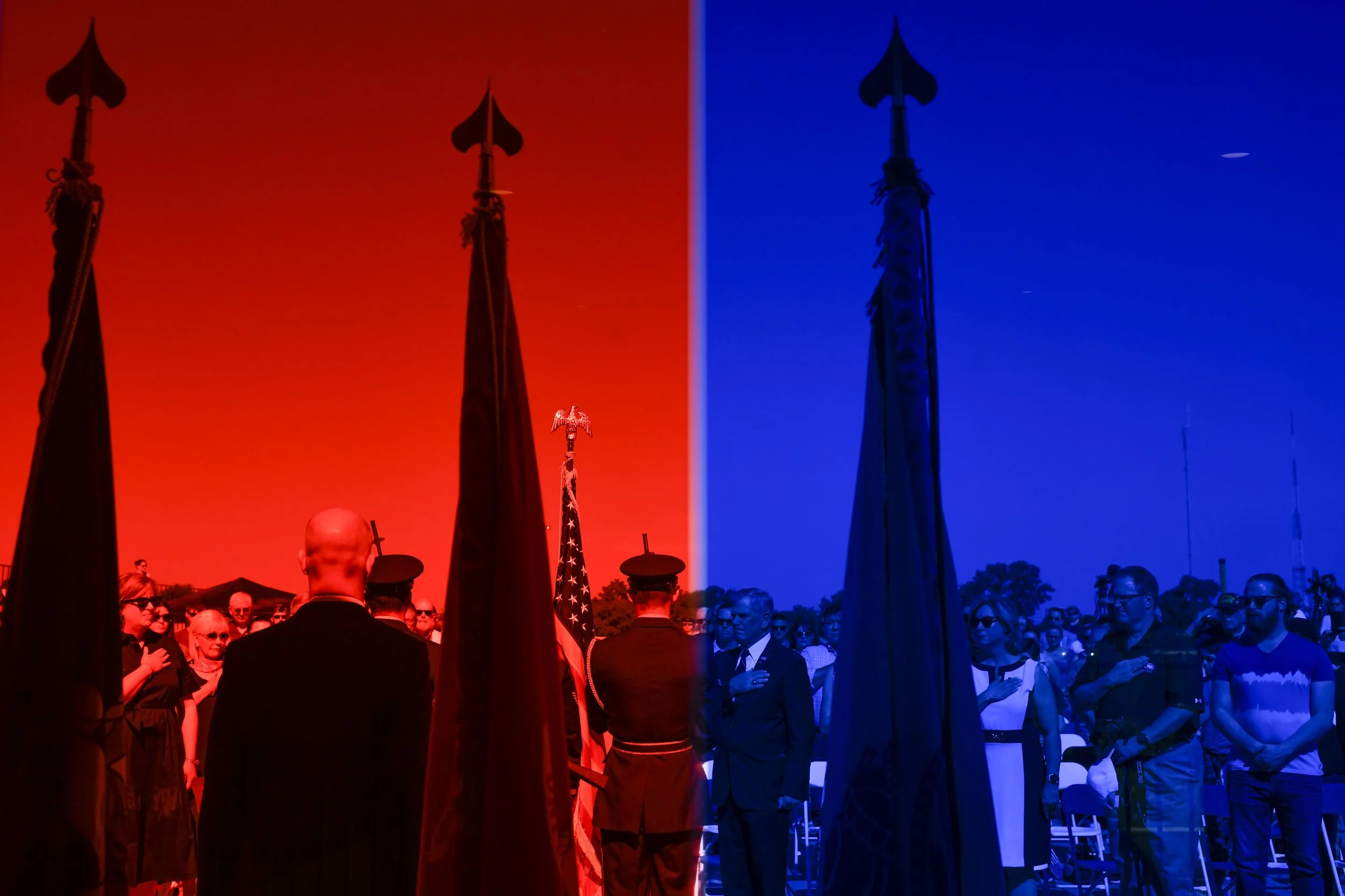  The Colors are Presented during the National Anthem, photographed through the museum’s colored glass, at a ceremony to mark Memorial Day at the National Veterans Memorial and Museum in Columbus, Ohio. 