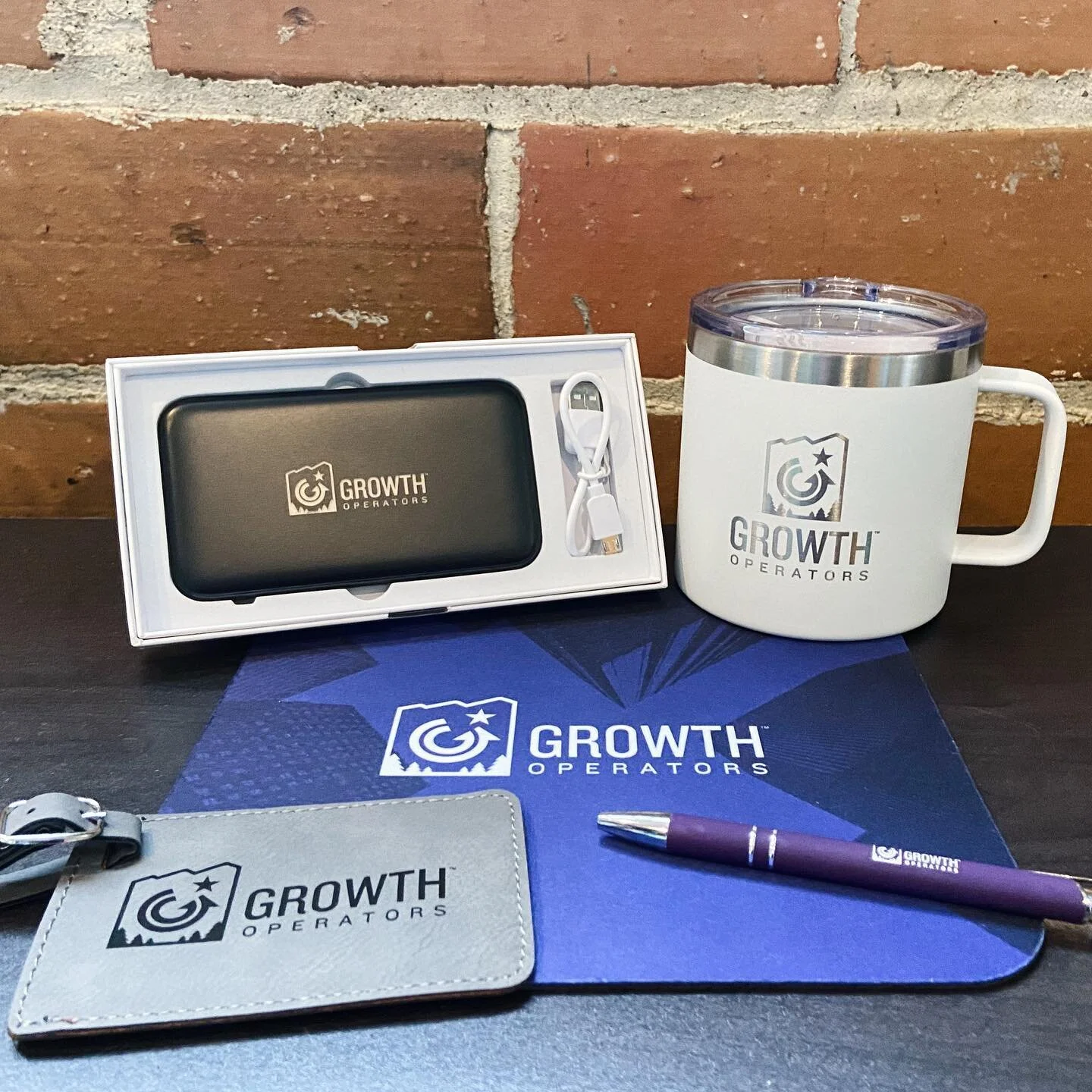 the key to successful employee onboarding? company-branded swag, of course 🙌

we partnered with Growth Operators to create these custom packages to welcome their new hires ~ each kit includes:

* leatherette luggage tag
* stainless steel camper mug
