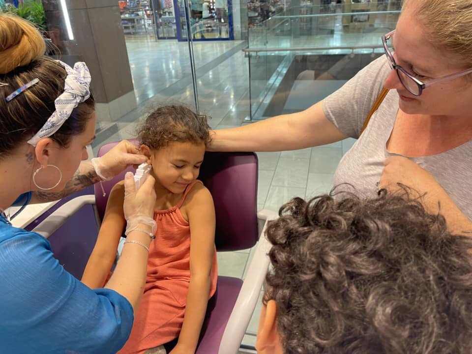 My baby girl actually laughed when getting her ears pierced.