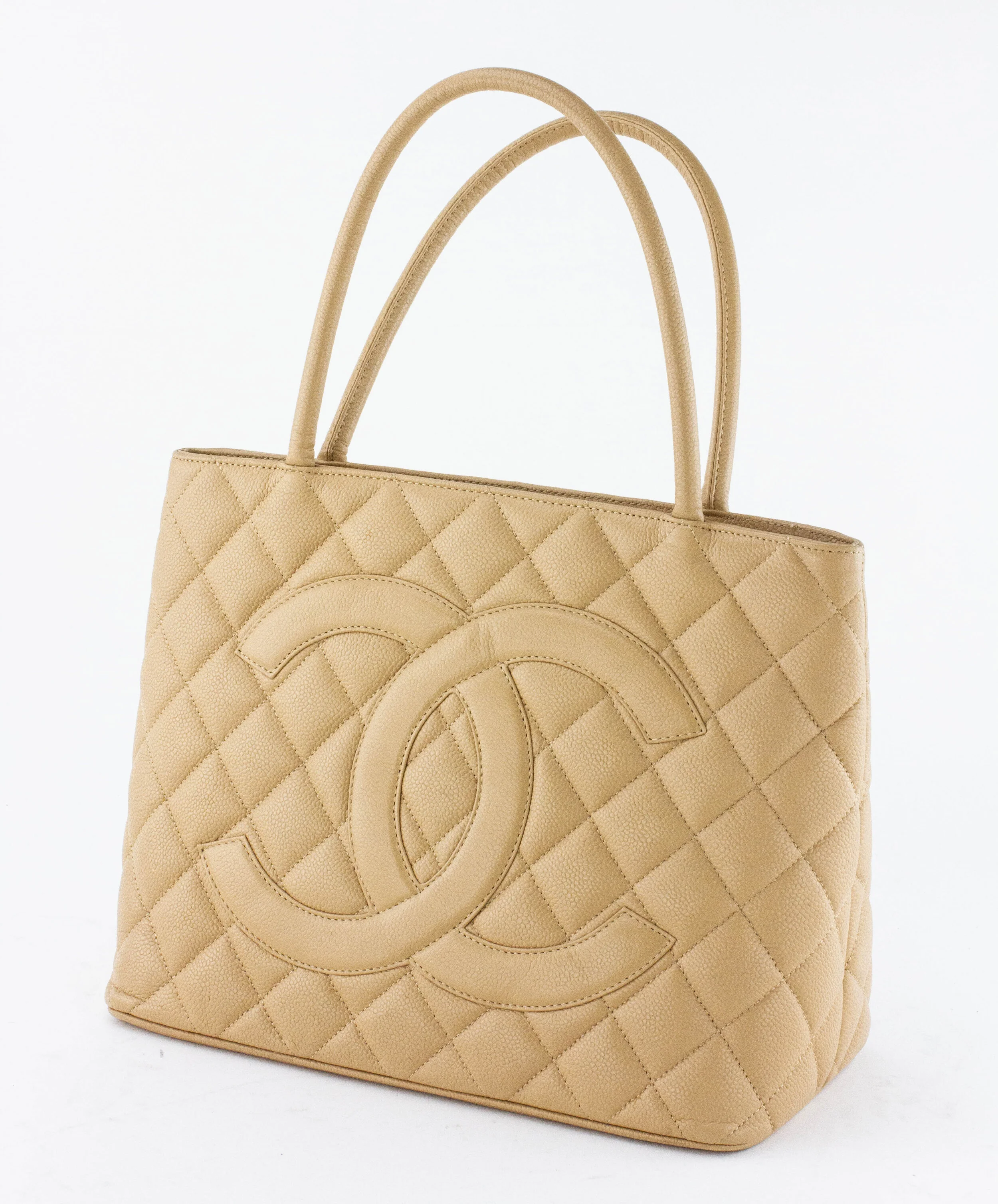 12909-76-CHANEL-tan-quilted-leather-medallion-tote-1.jpg