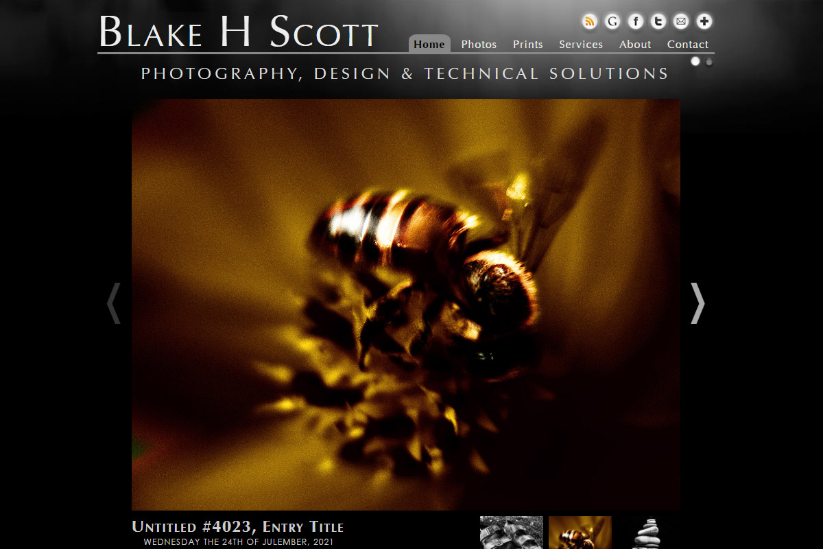 Photo Slideshow, Dark. Notice this image and the next image, both depicting the same slideshow. This one with a "dark" color scheme, the other with a "light" color scheme. Visitors could switch styles, and the site would remember their preference.