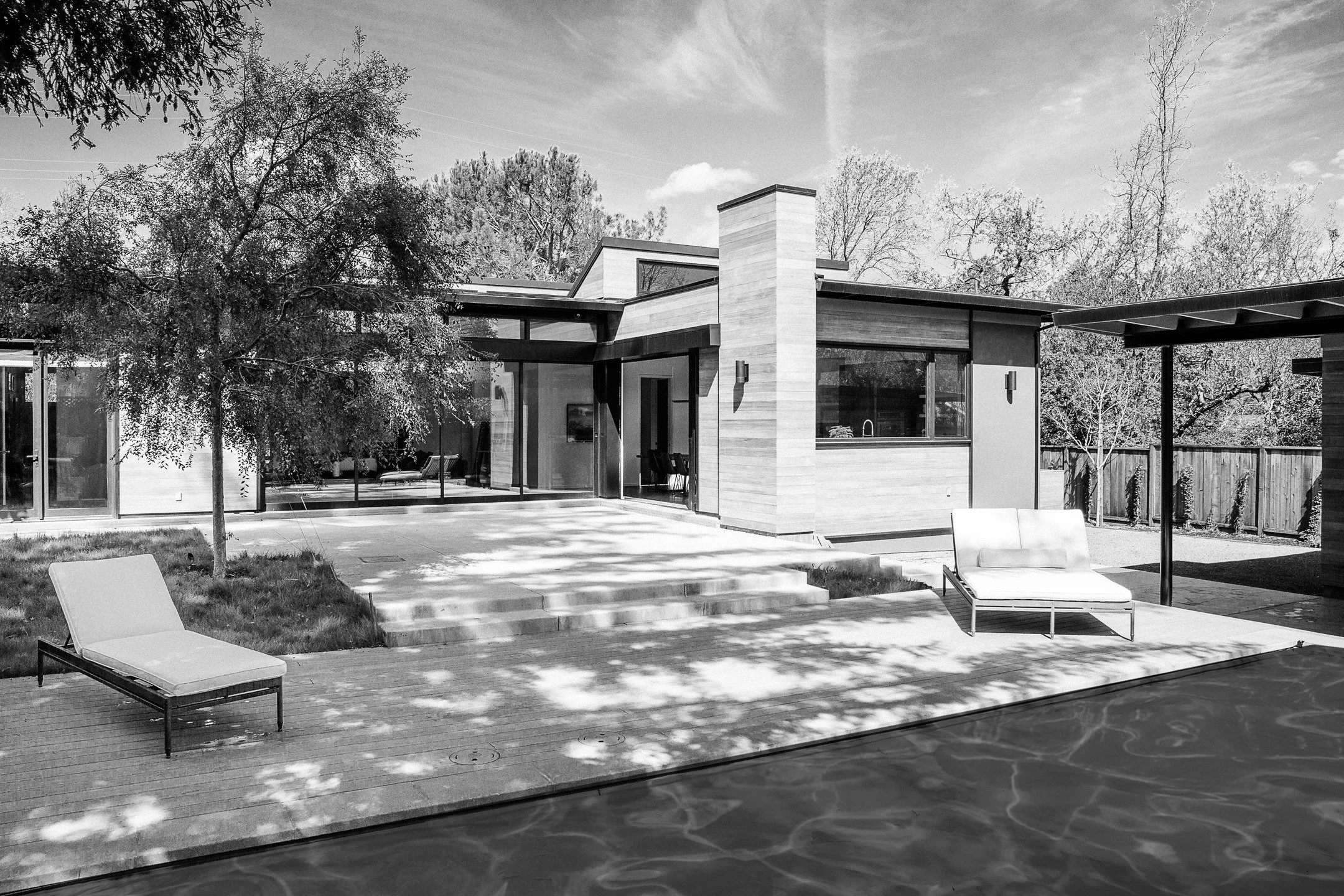 Love House, 2016, Lafayette.
Early Rear View.

An existing 2,200 square foot ranch in Lafayette, CA was fully re-imagined into a light-filled five-bedroom, three-bath, modernist home. 700 square feet of new space was sewn into the existing foundation