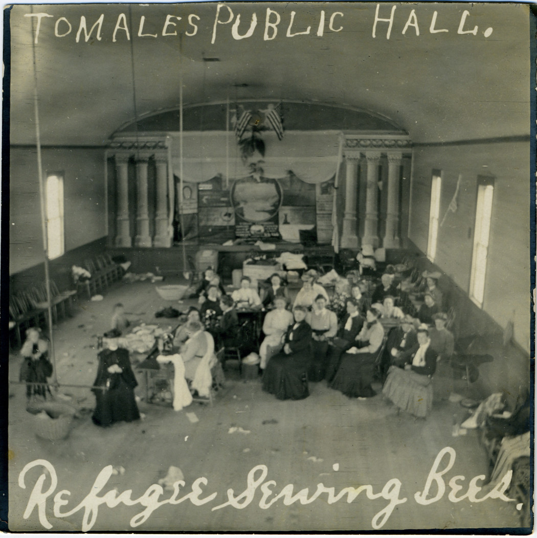 Sewing Bee at Tomales Town Hall to benefit Earthquake Refugees, 1906. Photo: Ella Jorgensen; courtesy Tomales Regional History Center.