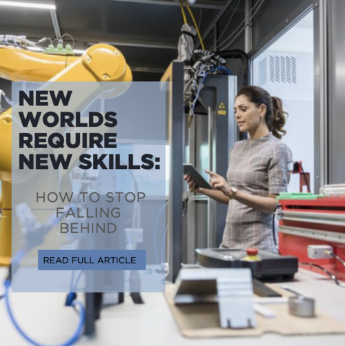 A woman in a gray checkered shirt with a ponytail uses a tablet in an industrial or laboratory setting. She stands in front of machinery with yellow and black components and appears to be working or inspecting equipment.