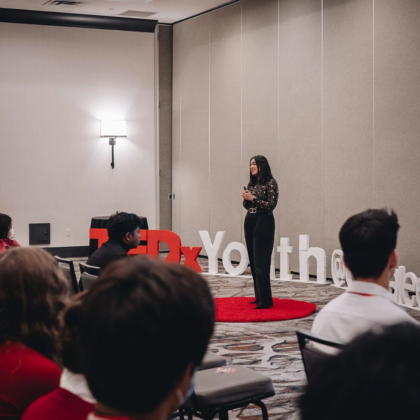 Aleenah speaking during TEDx Talk.JPG
