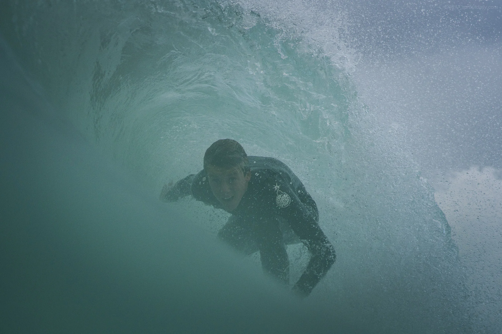 George tuck behind the curtain