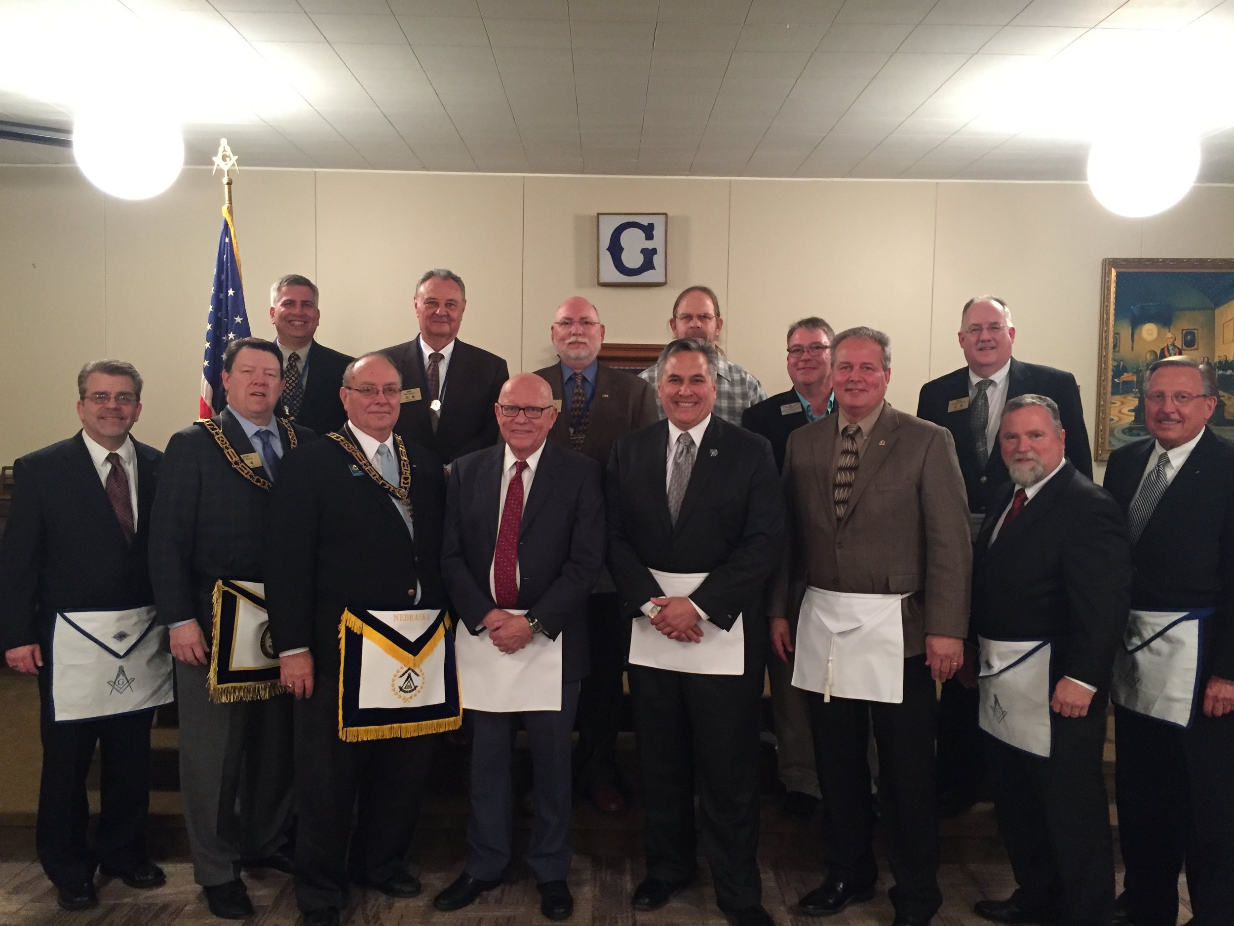Front Row: Ed Birmingham, Jr. of Plattsmouth Lodge #6, MW John T. Maxell, MW Rick Myers, Grand Master of Masons in Nebraska, Ed Birmingham, Don Shiu, Wayne Stuberg, WB Steve Barchus, MW Mike Gray Back Row: WB Dan Wellendorf, Don Kavalec, Carl Simmons, WB Mark Miller and WB Mike Tomasiewicz of Mizpah Lodge #302, and WB Paul Rutherford.