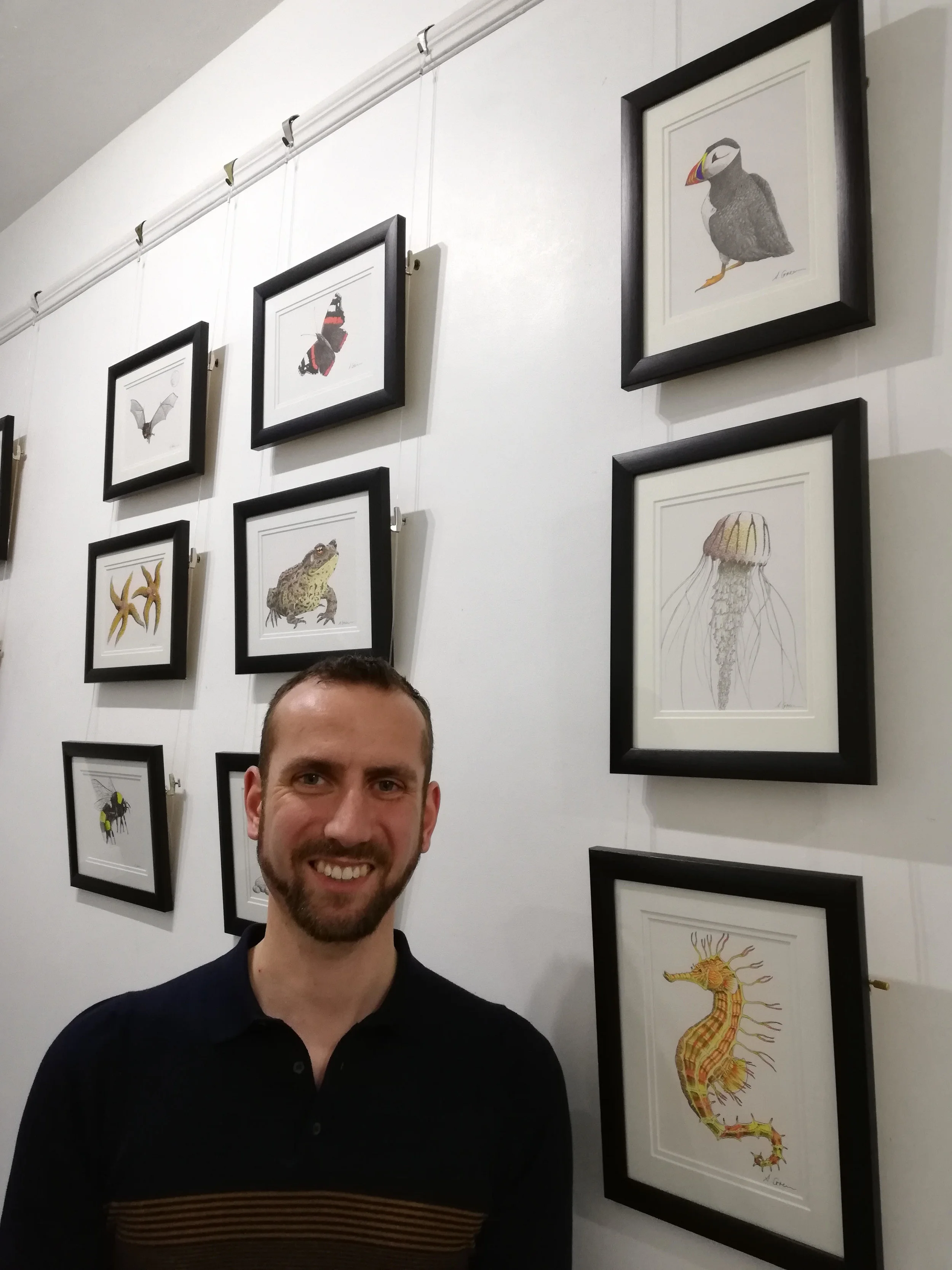 Andrew Grieveson in front of his Artwork in our Geddes Gallery.