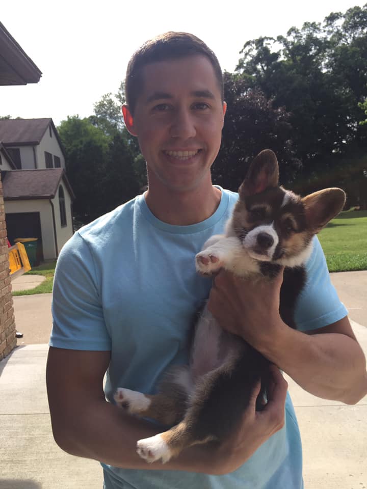  Zach Vaughn and Mabel, a 12 week old Corgi. 