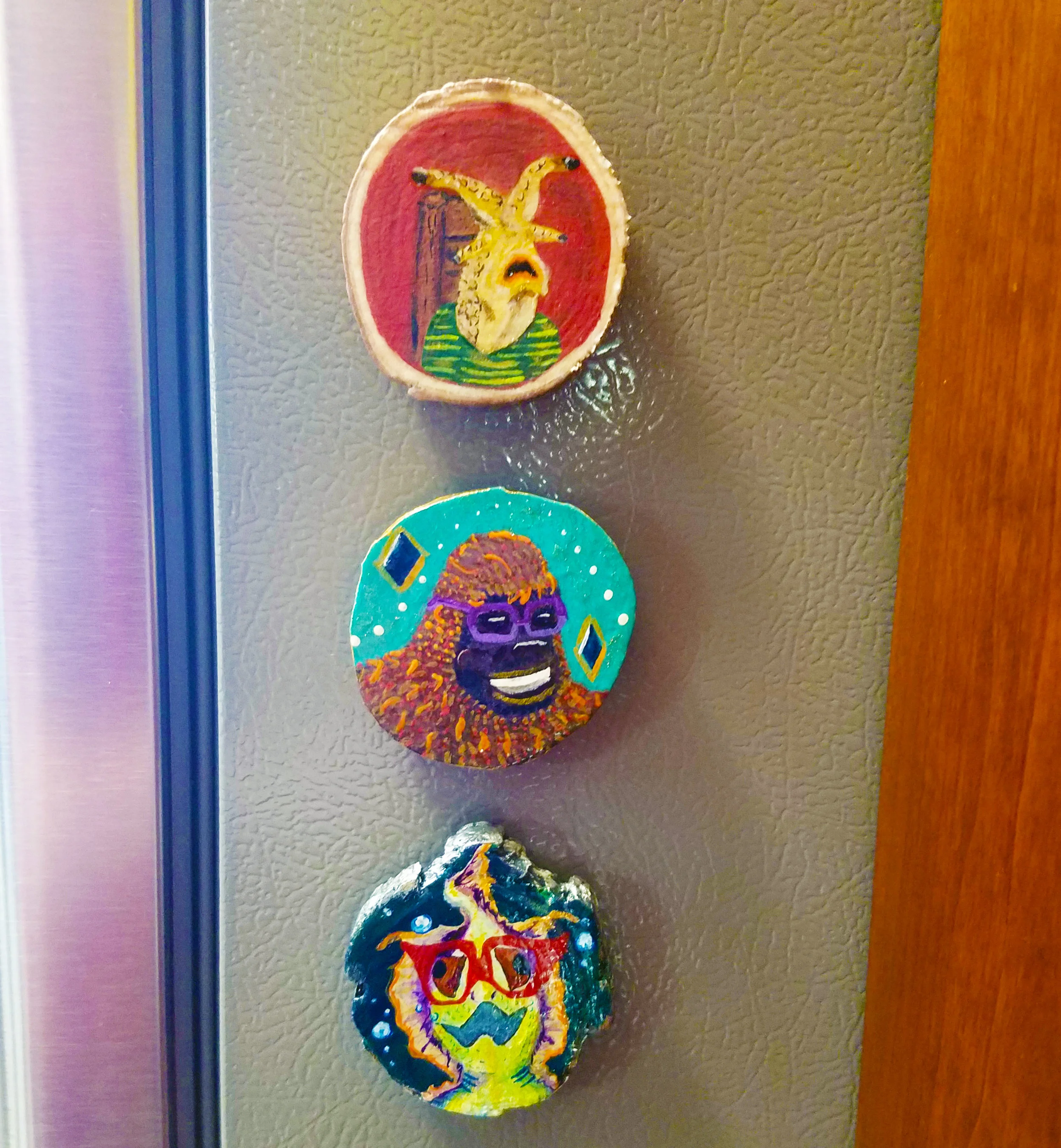 Portraits on side fridge.jpg