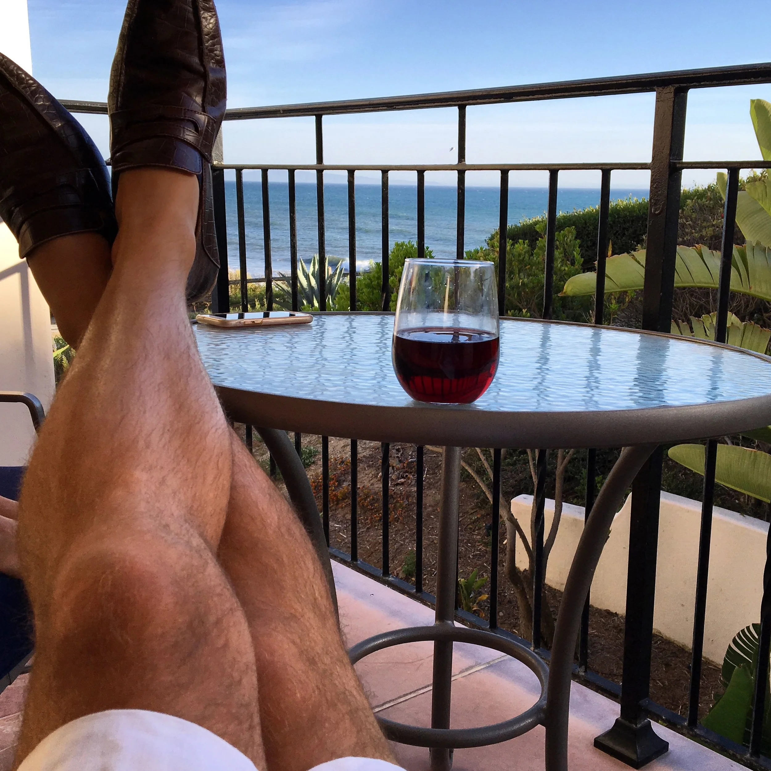 Enjoying the complimentary Pinot Noir.