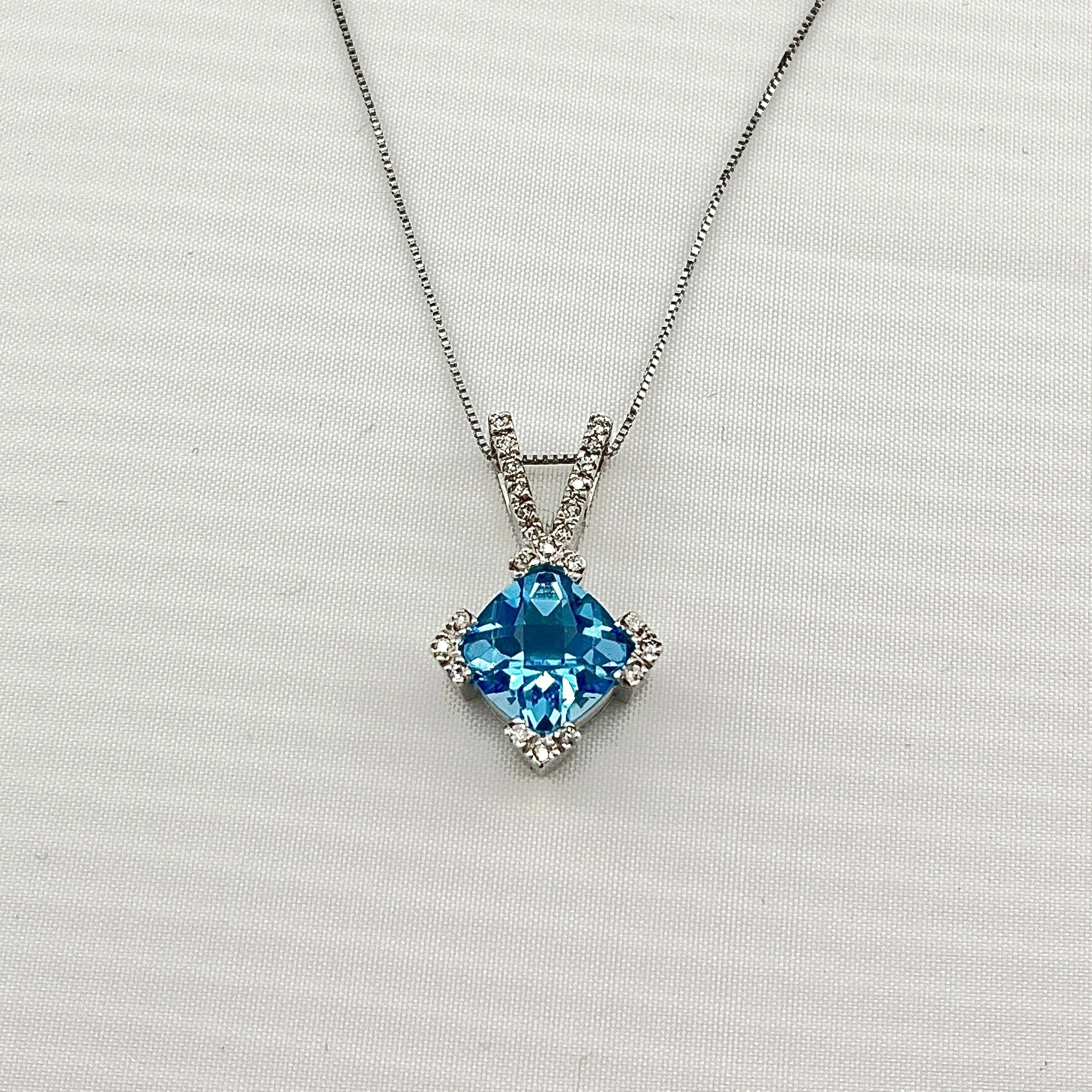 2.5CT CUSHION BLUE TOPAZ & 0.24CTW ROUND DIAMOND 14K WHITE GOLD NECKLACE 15"