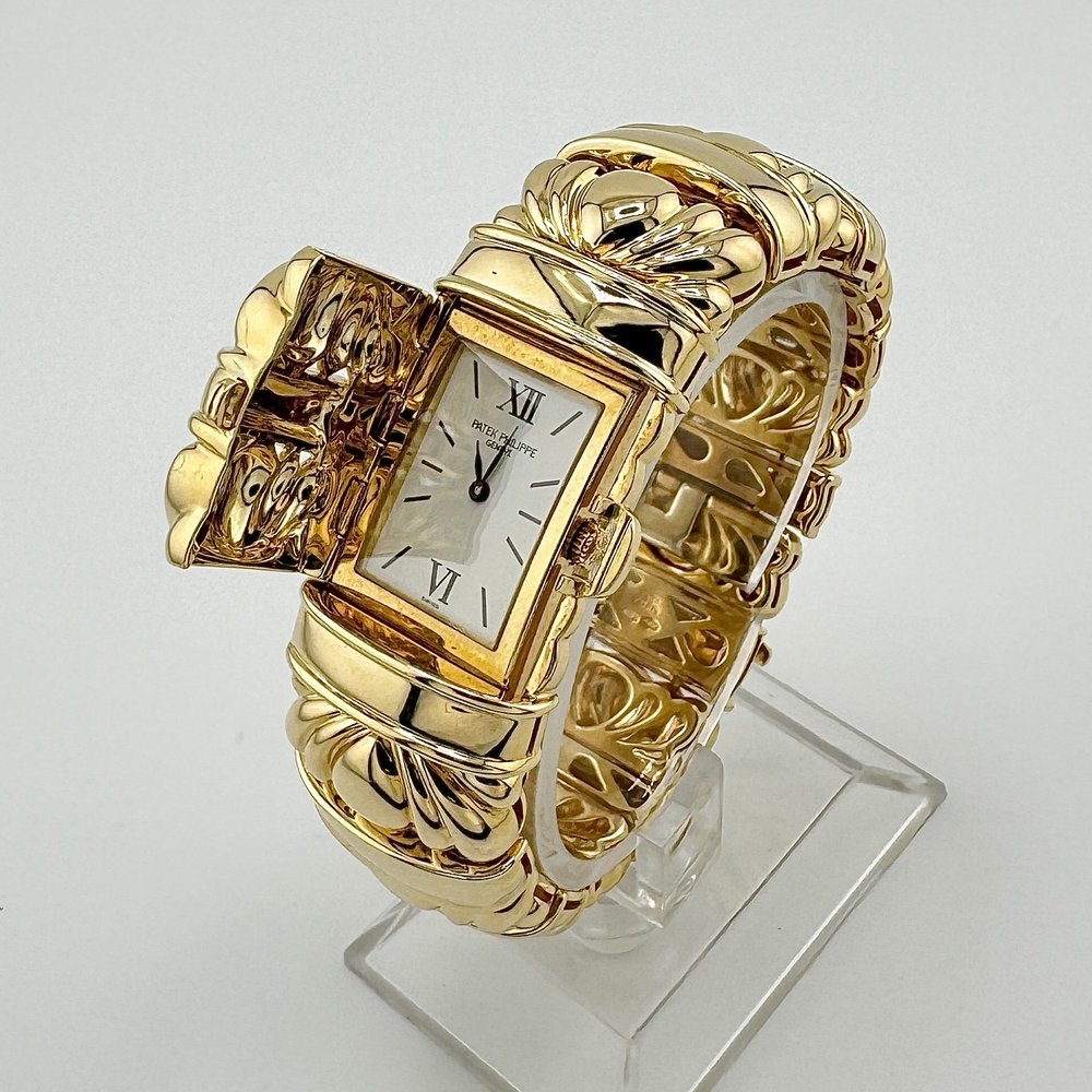 LADIES PATEK PHILIPPE REF 4955 18K YG BRACELET WATCH CONCEALED