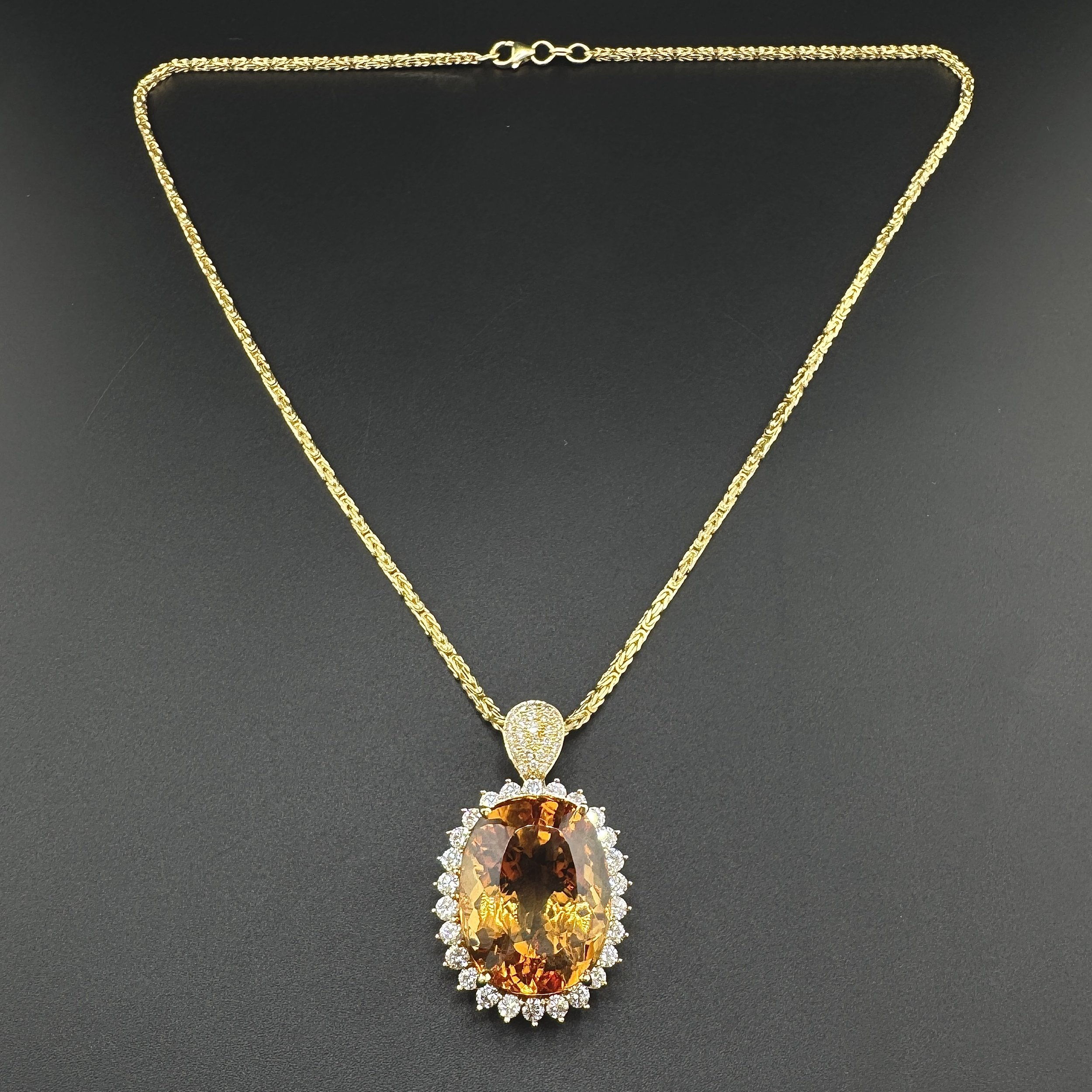 45CT OVAL IMPERIAL TOPAZ & 1.70CTW ROUND DIAMOND PENDANT NECKLACE - 18K YG