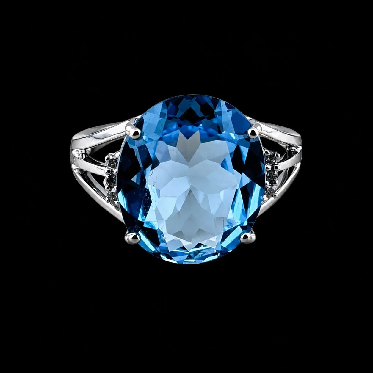 Oval Sky Blue Topaz and Accent Diamond Ring