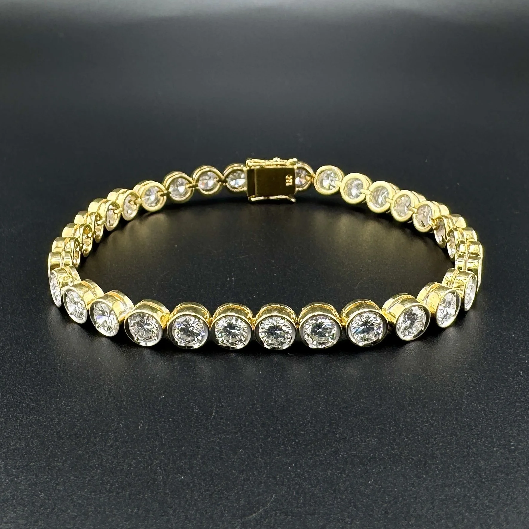 14.52CTW VS1 F-G ROUND BEZEL SET DIAMOND TENNIS BRACELET - 18K YELLOW GOLD - 7"