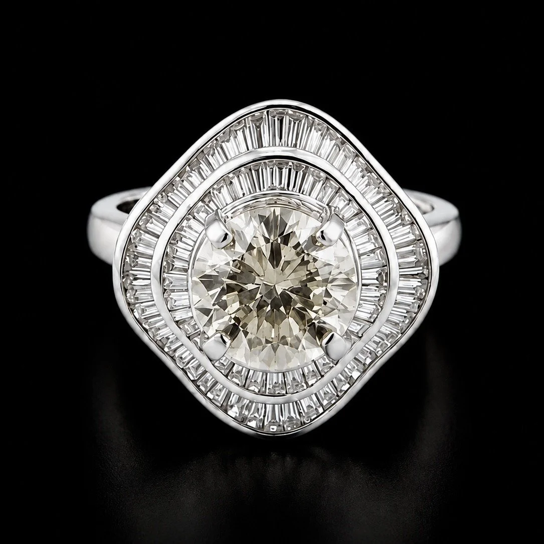 G.I.A. CERTIFIED PLATINUM ROUND & BAGUETTE DIAMOND COCKTAIN RING