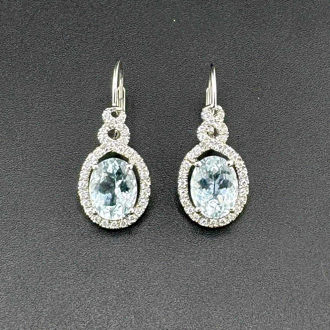 2.6CTW OVAL AQUAMARINE & 0.50CTW ROUND DIAMOND EARRINGS - 18K WHITE GOLD