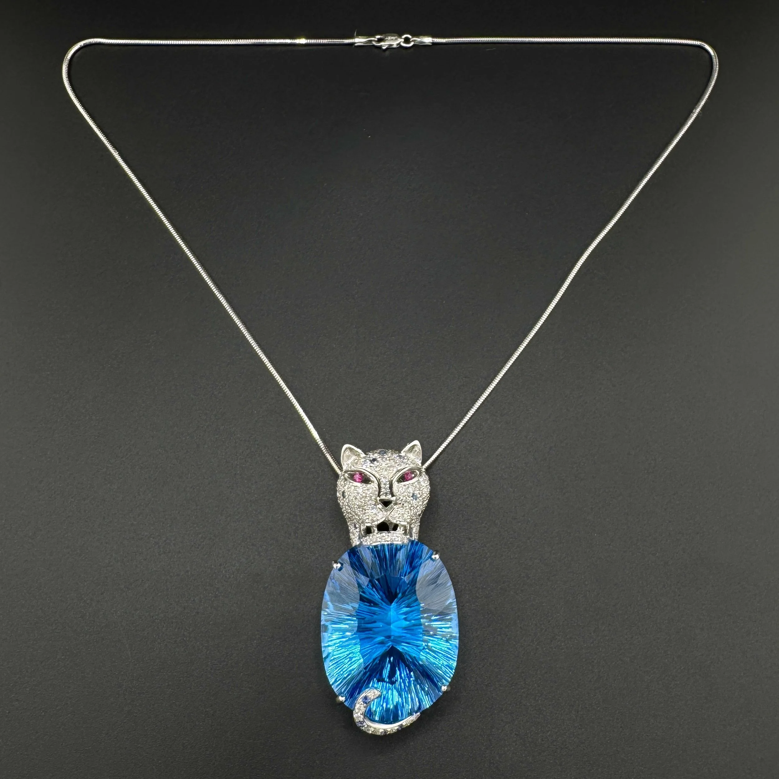 65.9CT OVAL BLUE TOPAZ / DIAMOND / RUBY / SAPPHIRE PANTHER NECKLACE - 18K WG 18"