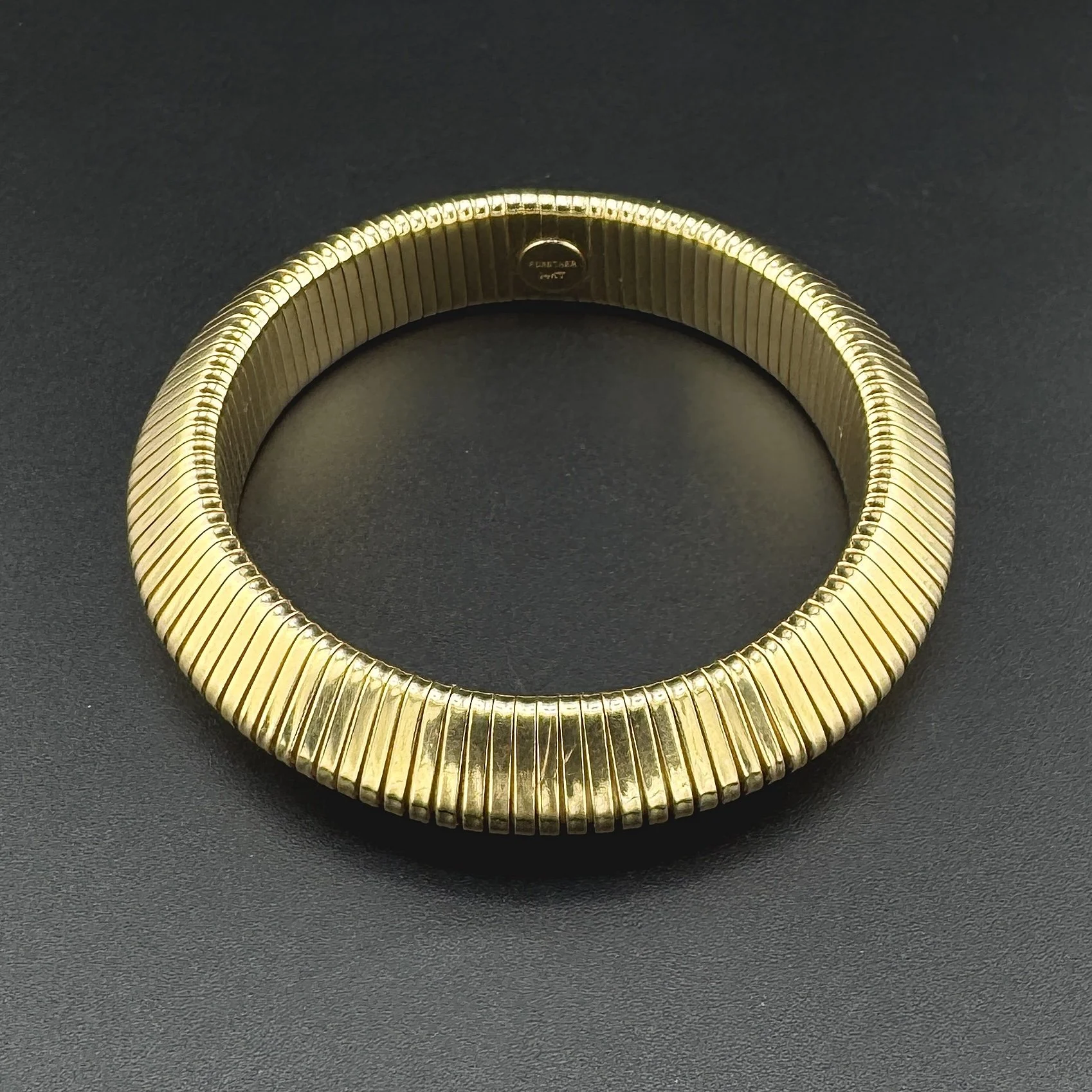 FORSTNER OMEGA FLEX BANGLE BRACELET - 14K YELLOW GOLD - 6.5"