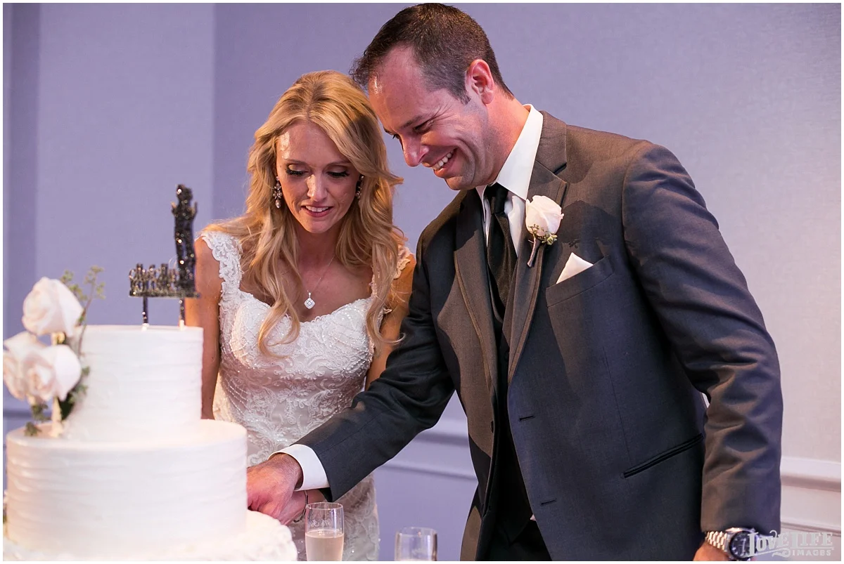 Mayflower Hotel DC Wedding cake cutting.jpg