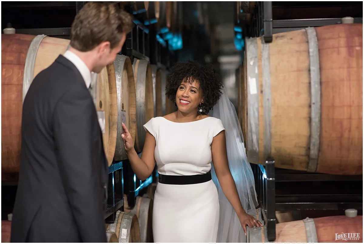 District Winery DC Wedding portrait in wine barrels.jpg