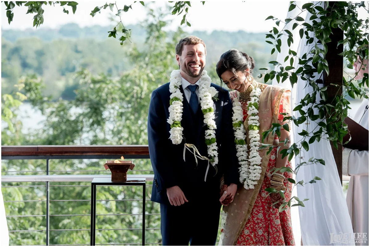 Multicultural District Winery DC Wedding ceremony bride and groom laughing.jpg