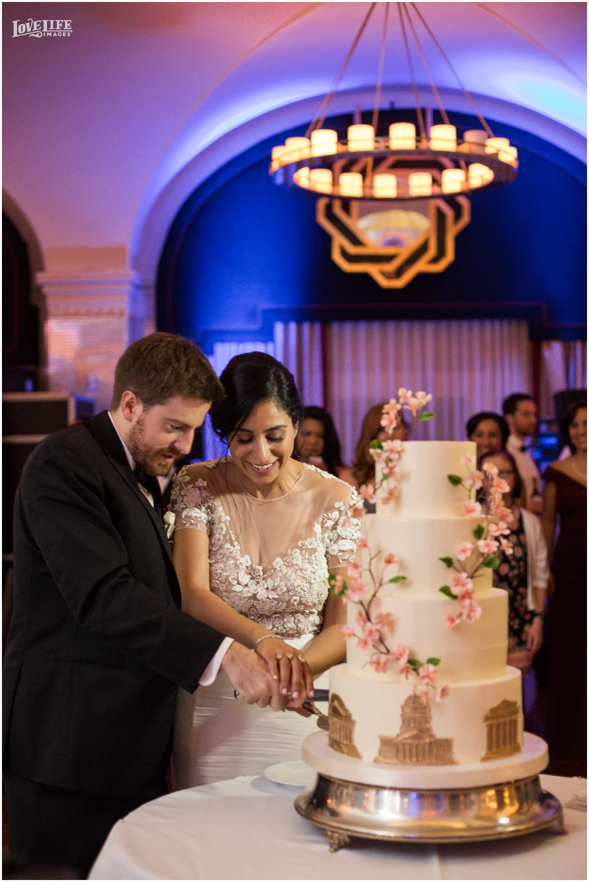 Hotel Monaco DC Wedding cake cutting.jpg