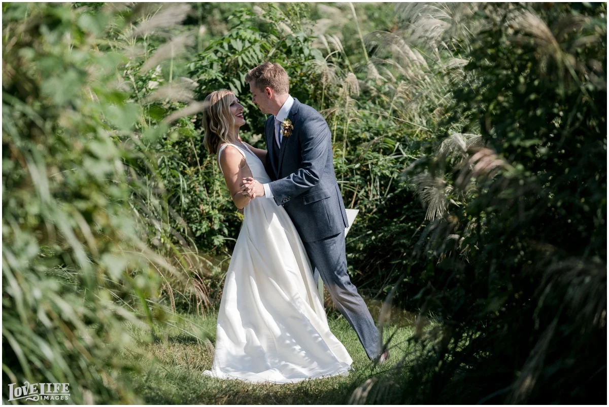 River Farm Wedding first look in field.jpg
