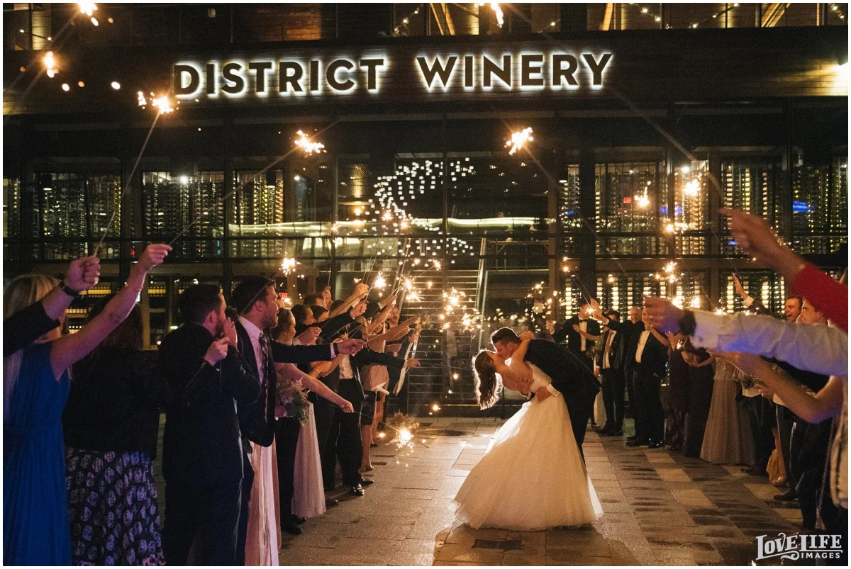 District Winery DC Wedding sparkler exit kiss.jpg