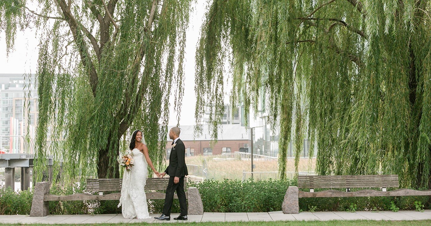 Miguel &amp; Adey take a stroll in the park at their District Winery wedding this past fall.