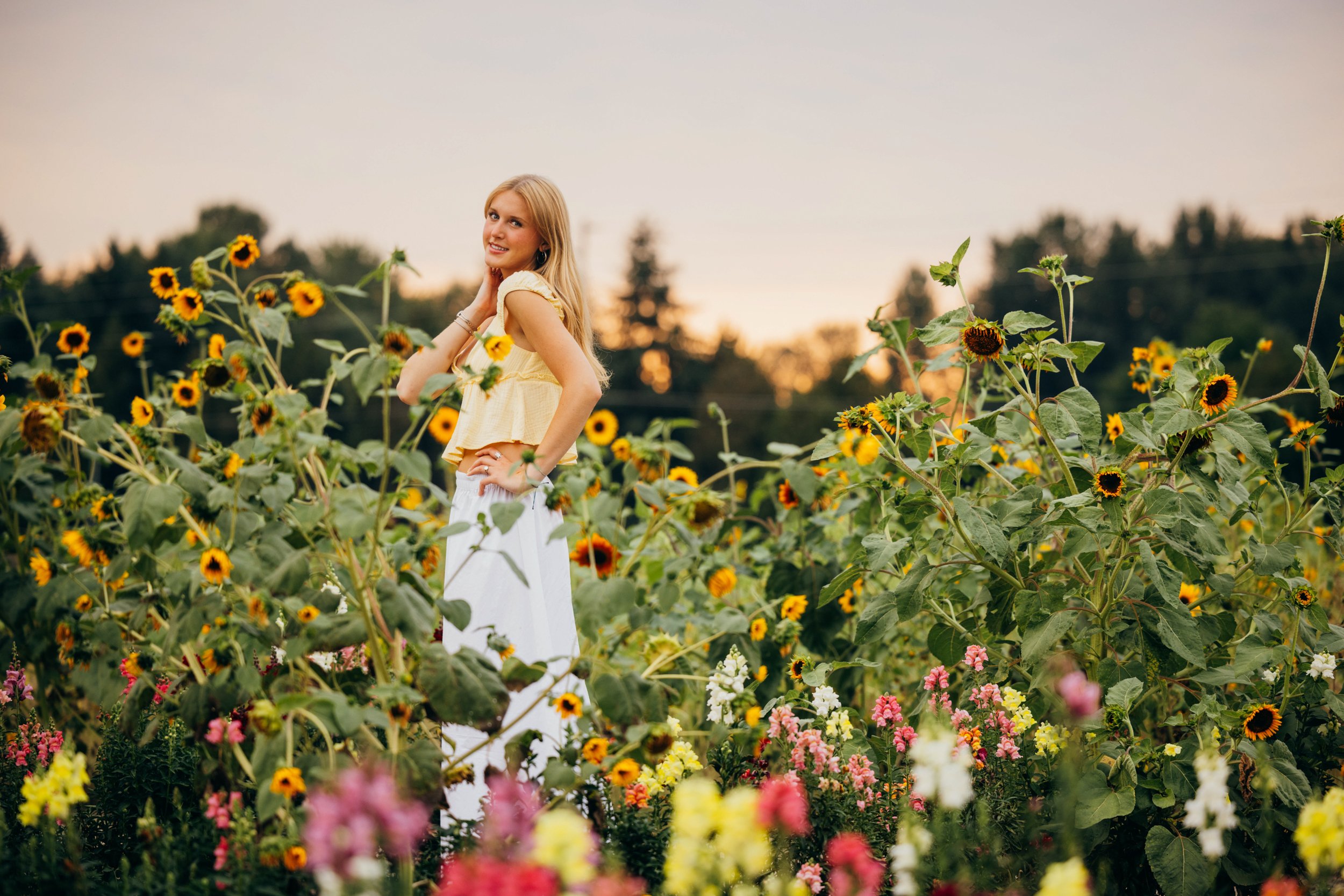 Senior in white skirt in flowers, jb family growers