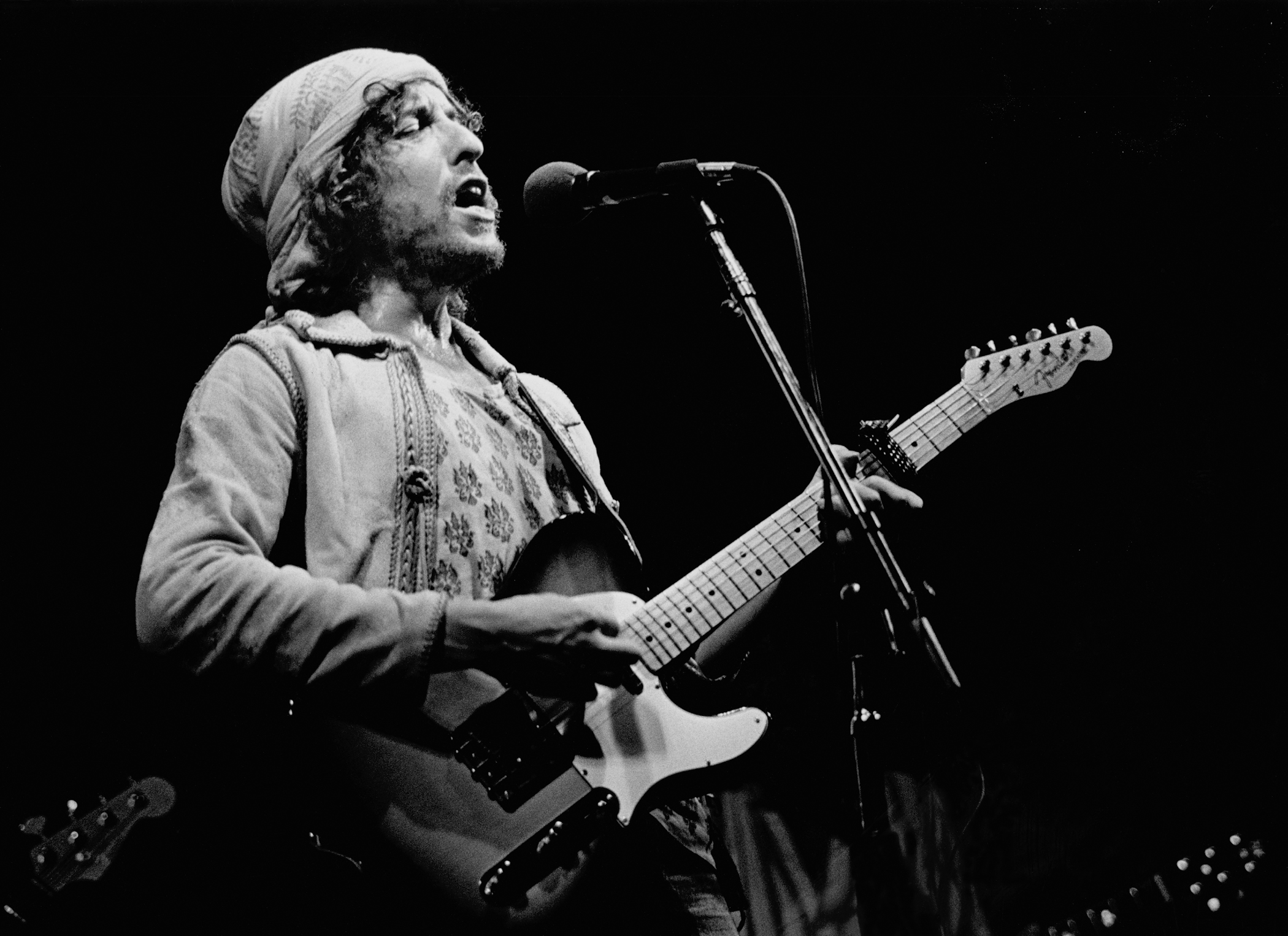Photo: © Mark Petty 1976. Bob Dylan performing at the University of West Florida during the Rolling Thunder Revue tour