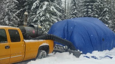 The Arctic Heat Blower warms up the cat which is under the tent!