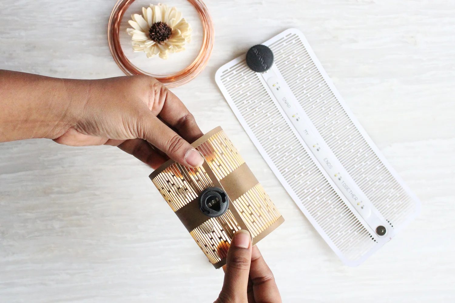 Snap Diah's ends together to turn on. We like to assemble Diah with the LED strip inside. Feel free to do it the other way around for a different feel.