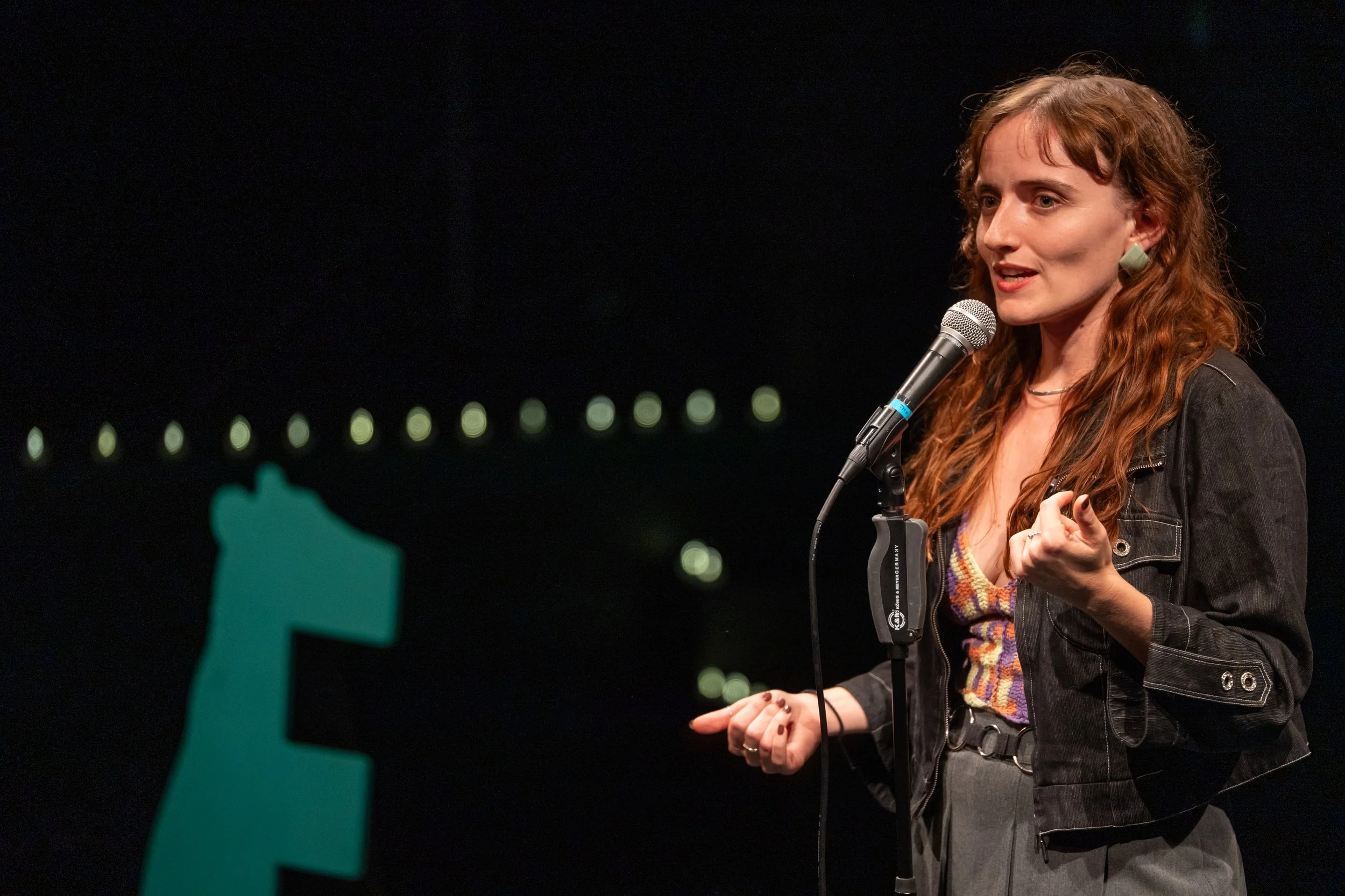Izzy Ahrbeck, host of THE BEAR live storytelling show in Berlin.