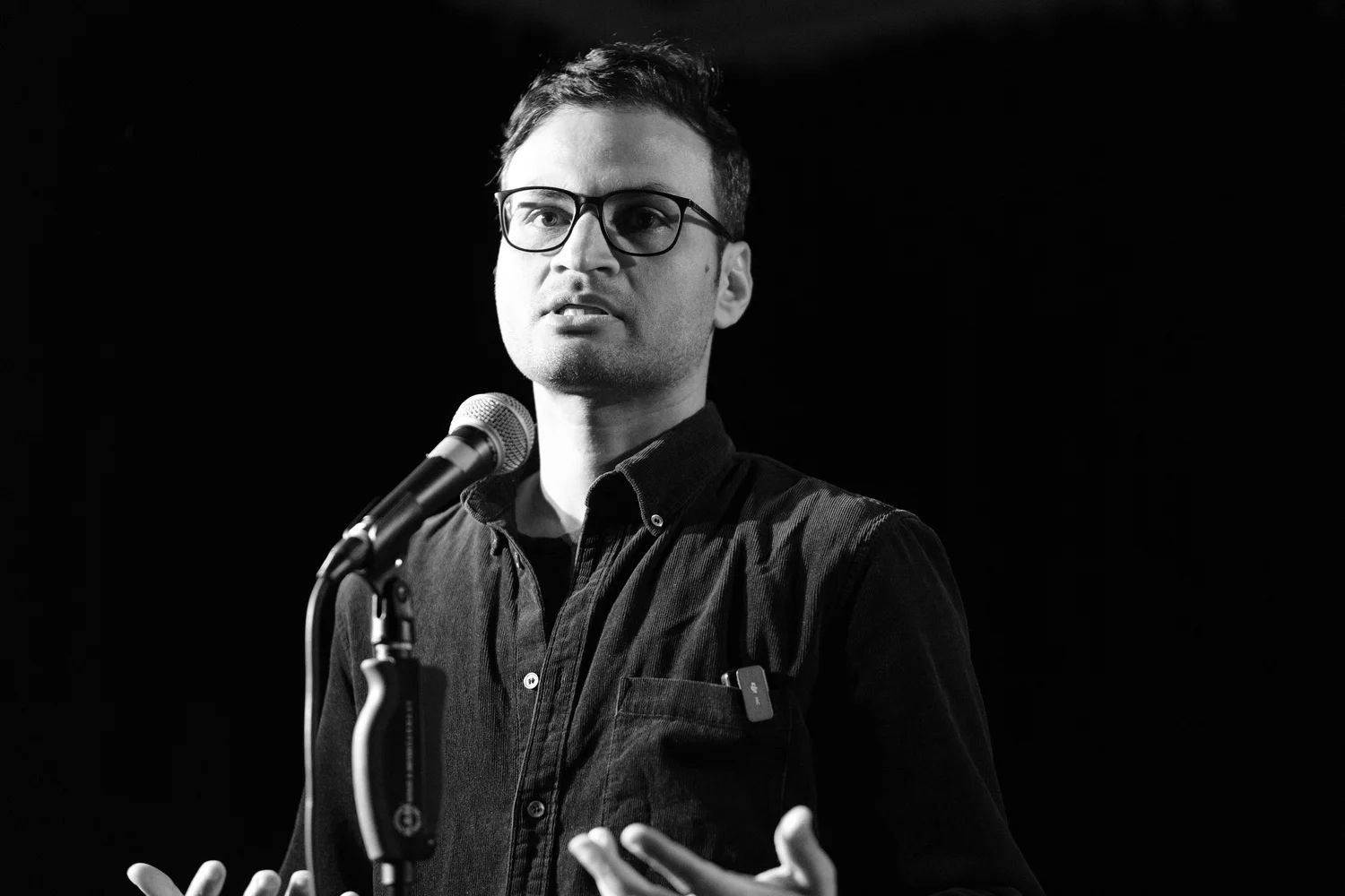 Furqan Hameed talking into a mic