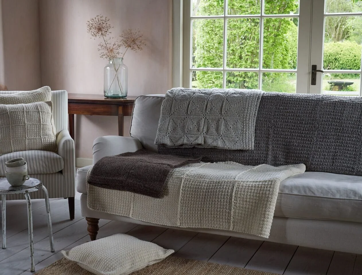all the crochet on sofa.jpg