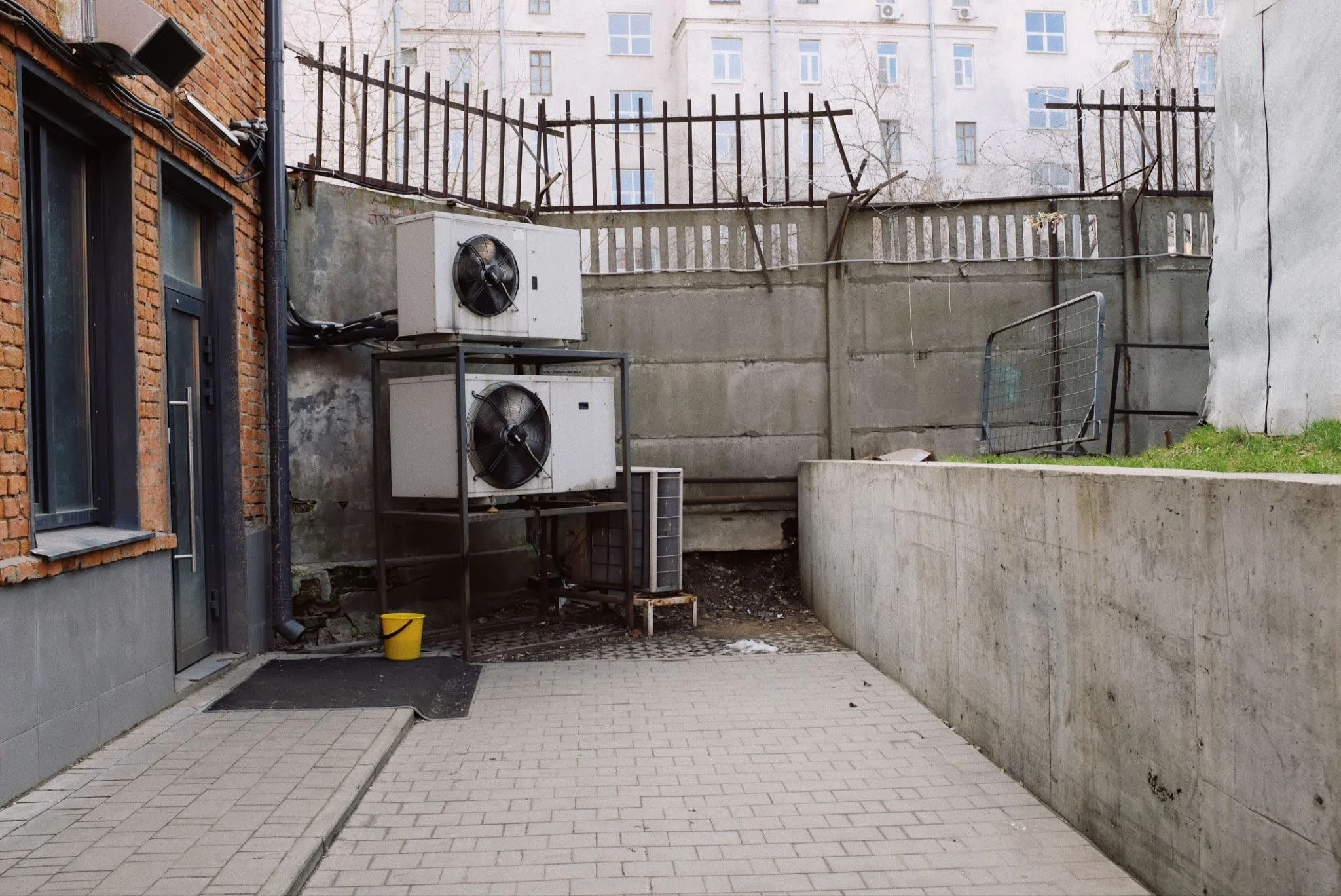 Some air conditioning compressors outside a home
