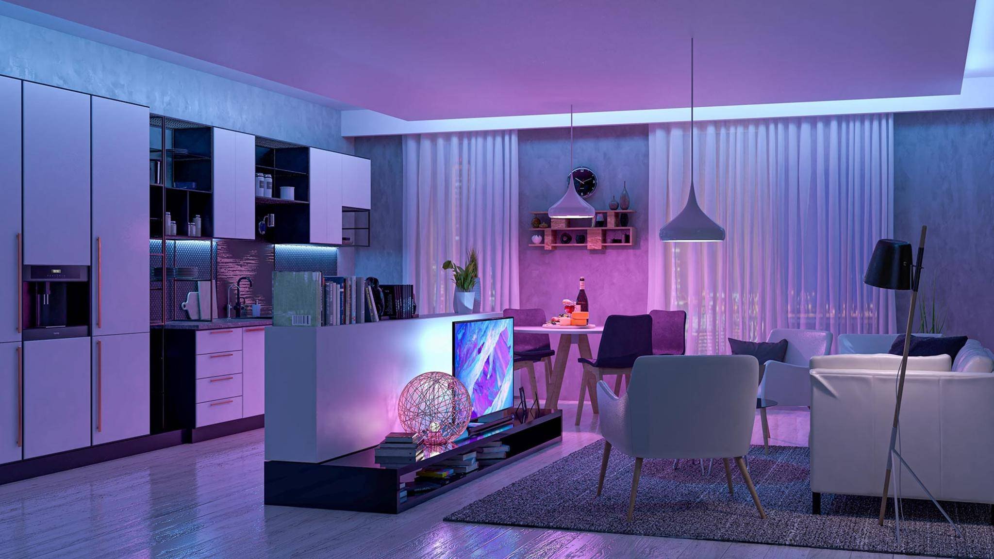 A subtle lighting setup for a living room and kitchen