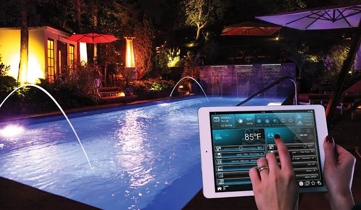a swimming pool being managed by a tablet app