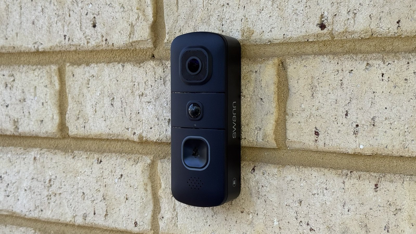 swann evo doorbell mounted on a brick wall