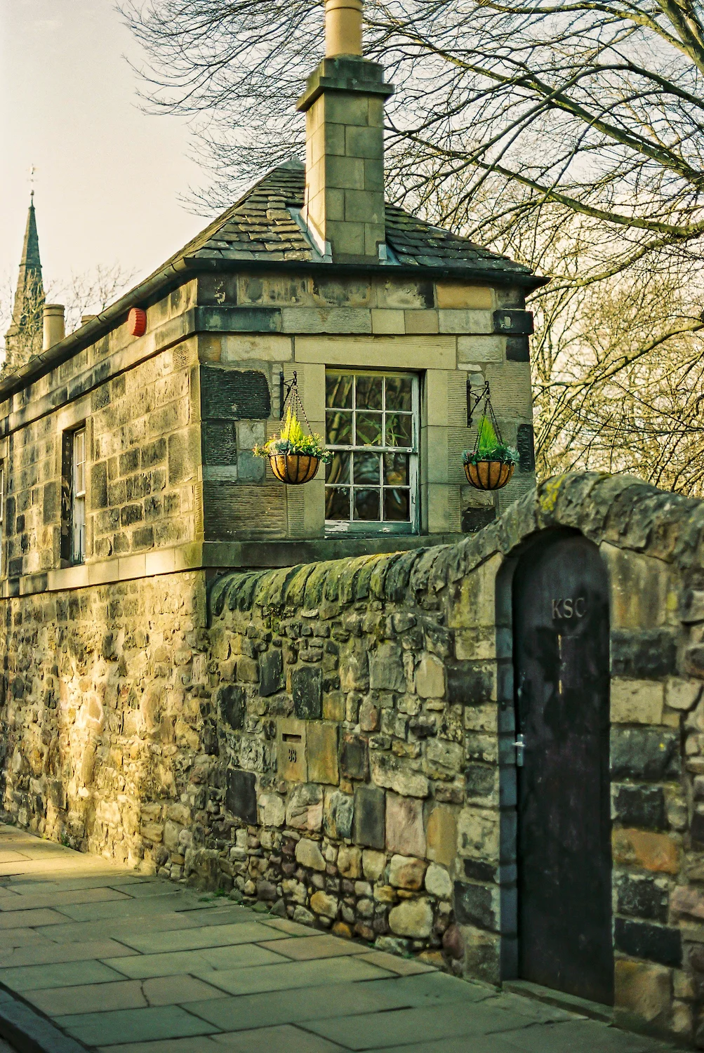 (1352) The Old School House for St Cuthbert's Church, Grade B Listed Cottage, St Cuthbert's Churchyard, King's Stables Road, Edinburgh, Scotland. 35mm film copy.jpg