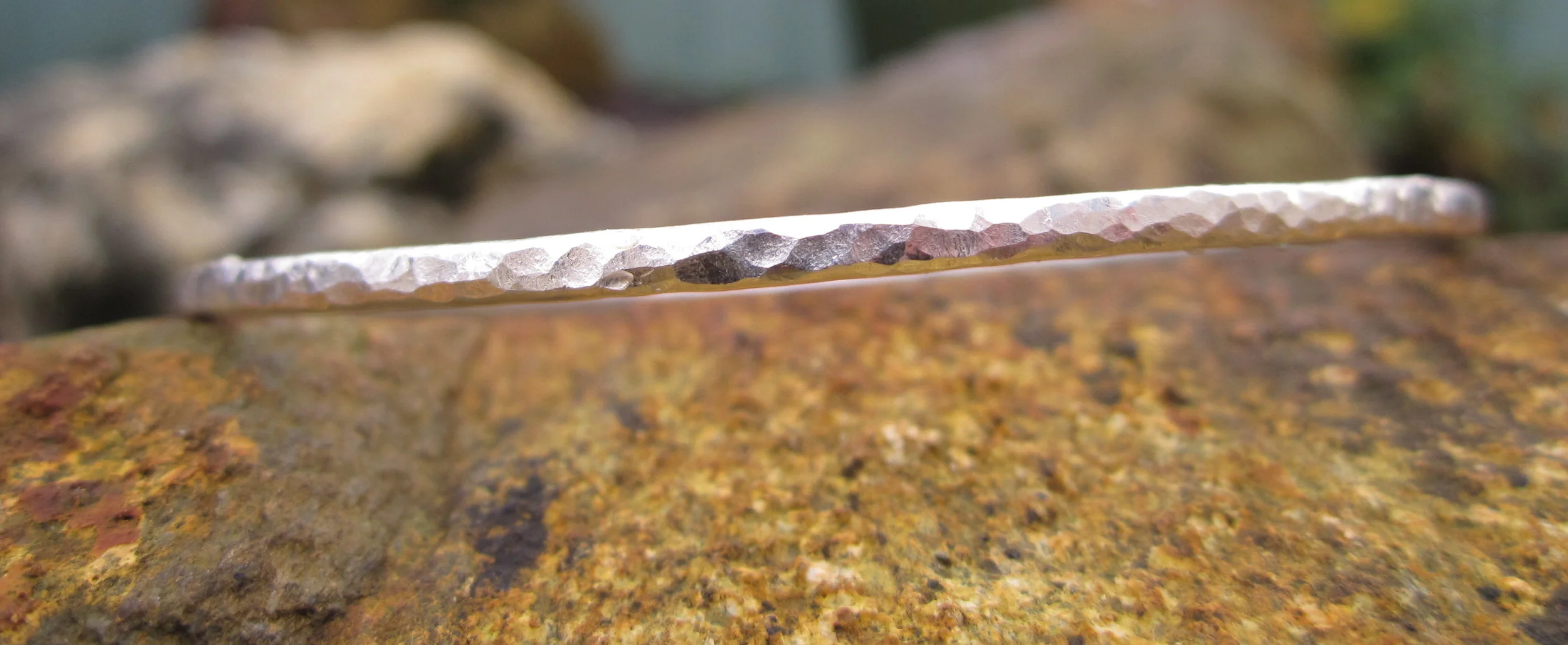 hammered bashed solid silver bangle/bracelet handmade cornish cornwall round oval