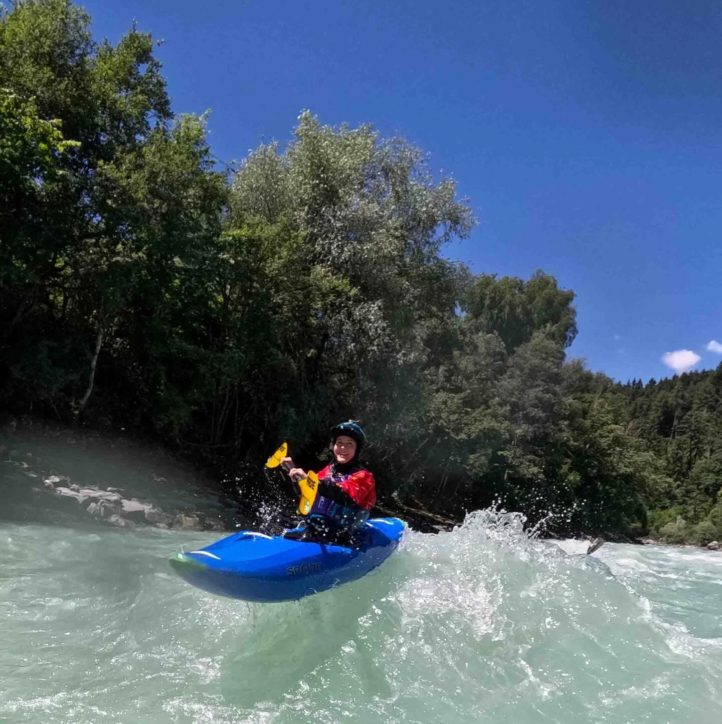 The sun is out and Niamh has a big smile on her face catching air off the big waves of the Imst Gorge here in Austria 🇦🇹 
.
.
#whitewater #wildwasser #kajakschule #kajakkurs #kayakcourses #kayakaustria #kayaking #austria #tirol #tyrol