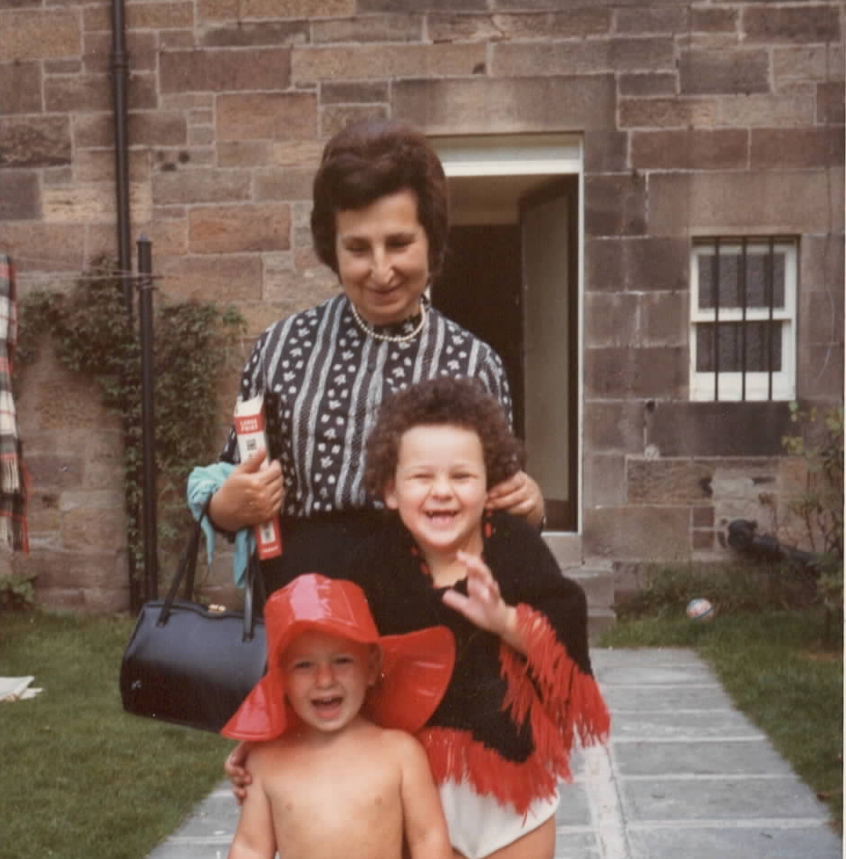 Eva (Nana Rosen), in Sara's childhood garden with Sara and one of her brothers, Ben