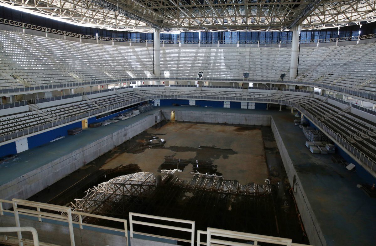 Inside the Aquatic Center, the pool is drained except for some unpleasant standing water | Pilar Olivares/Reuters