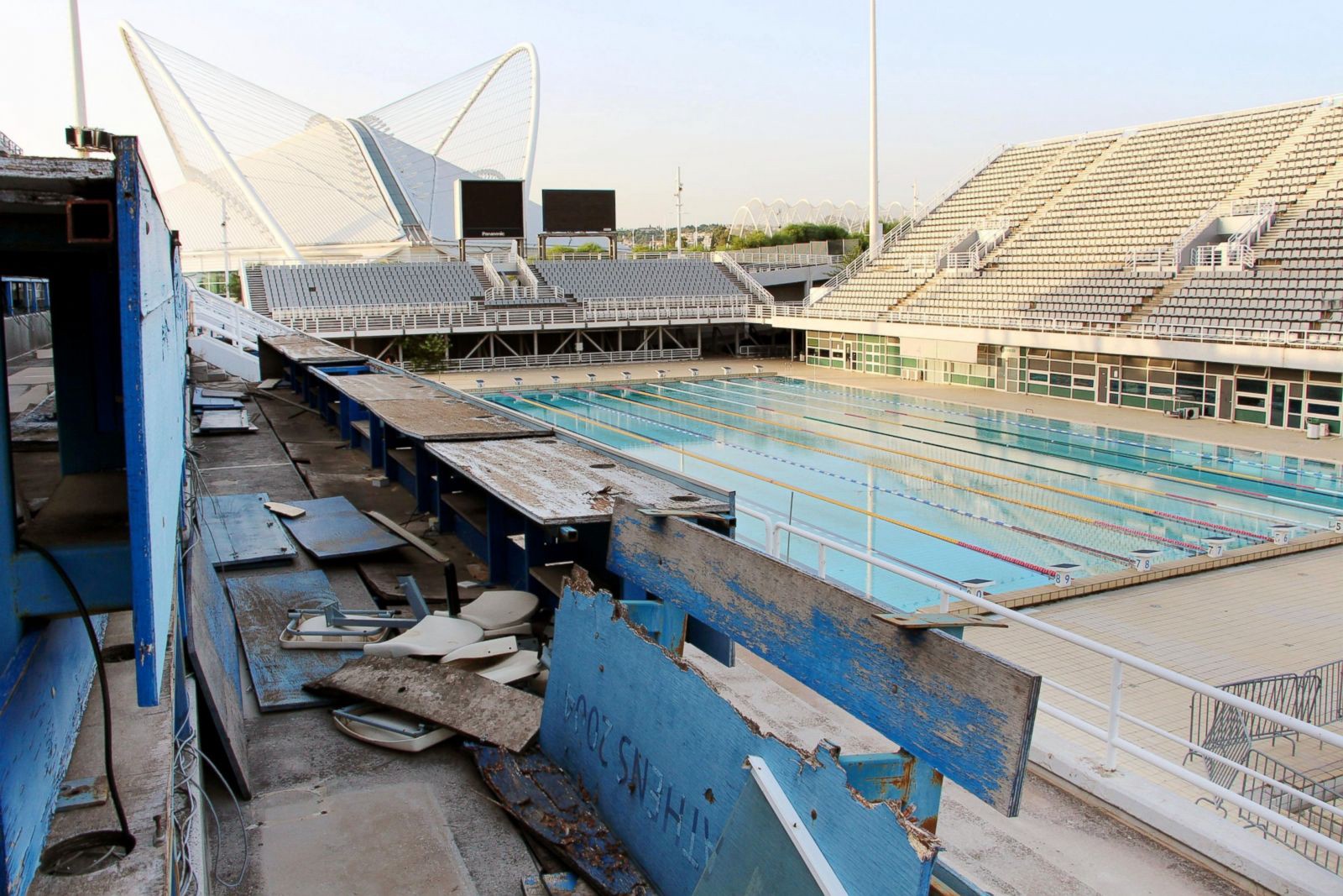 Seats for reporters at the main swimming pool for the 2004 Summer Olympic Games in Athens remain desolate | Kyodo News/Newscom